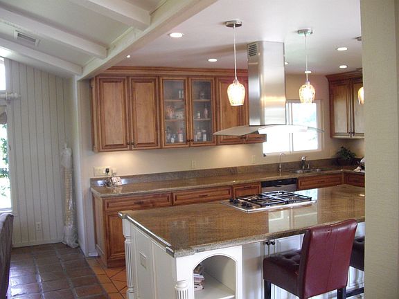 Kitchen features open beams