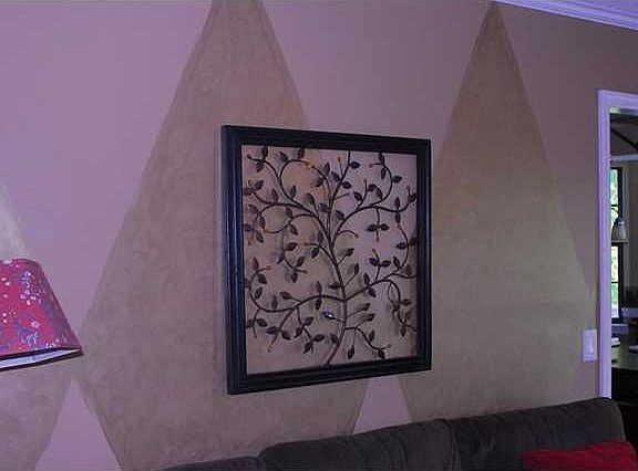 Custom paint in the den is beautiful!