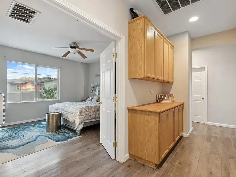 Upstairs hallway with cabinet storage