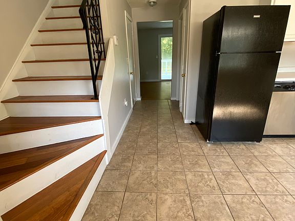 Entrance to the home. Kitchen to the right, coat closet to the left.