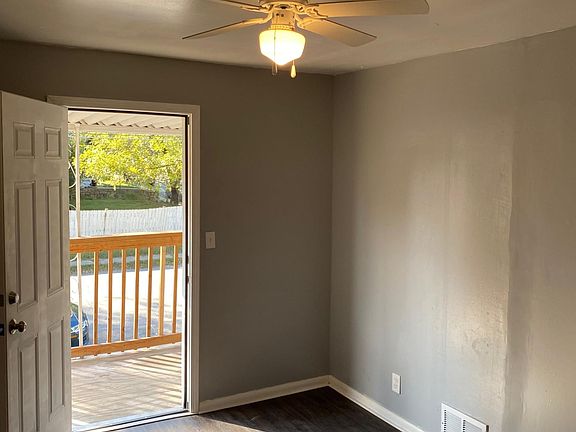 view inside bedroom #2 with balcony look outside