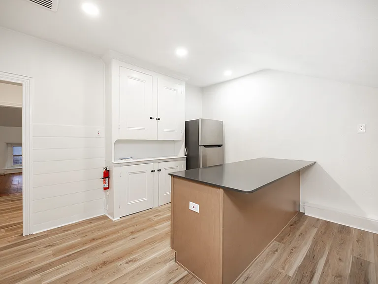 pantry cabinet, stainless fridge