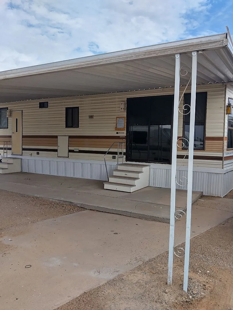 Fresh One-Bedroom Park Model with Large Covered Patio — Photo 1