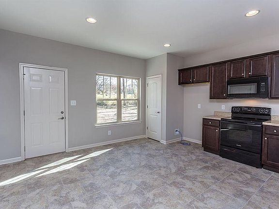 Access to the backyard from the kitchen. Open modern floor p