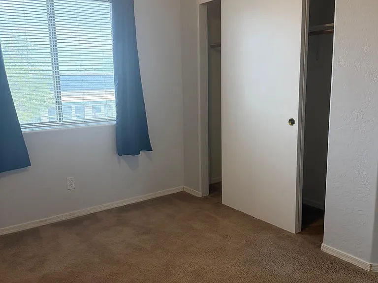 Bedroom 3 faces West. and has a ceiling fan. All bedroom Windows have sun-blocking drapes and sun screens for additional comfort.