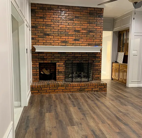 Living Room with gas fireplace, and butlers pantry.