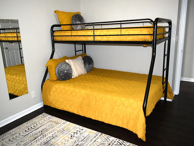 A bunk bed that is ideal for children and adults. It is a twin-over-full-size bed.