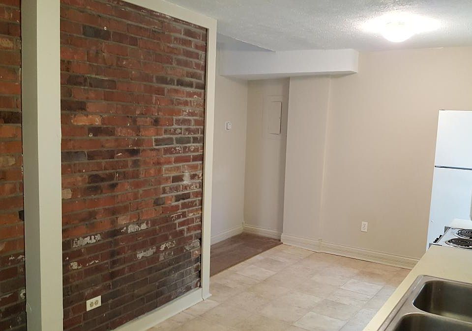 Kitchen - original brick accent