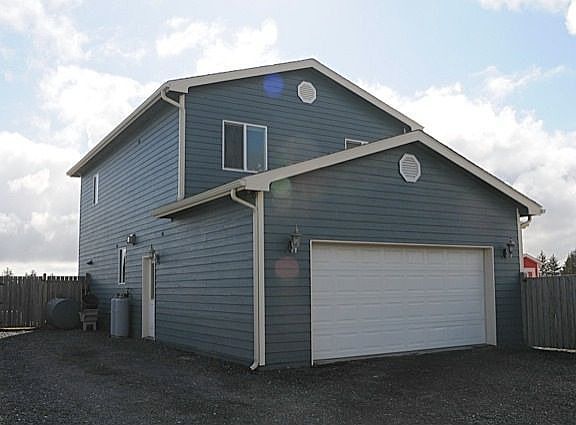 two car garage and lots of parking