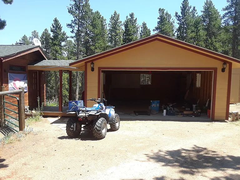 Front door and 2-stall garage