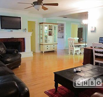 Living Room with view of Dining Room-TV and Functioning Wood