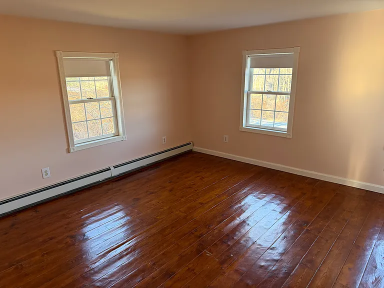 Second bedroom, currently being painted white