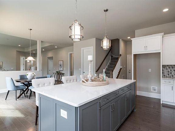 Gourmet kitchen features a large island