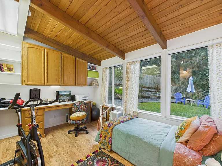 +Sunroom/office
+Exterior Access
+Desk with monitor/printer
+Workout bike + yoga equipment
+Door locks