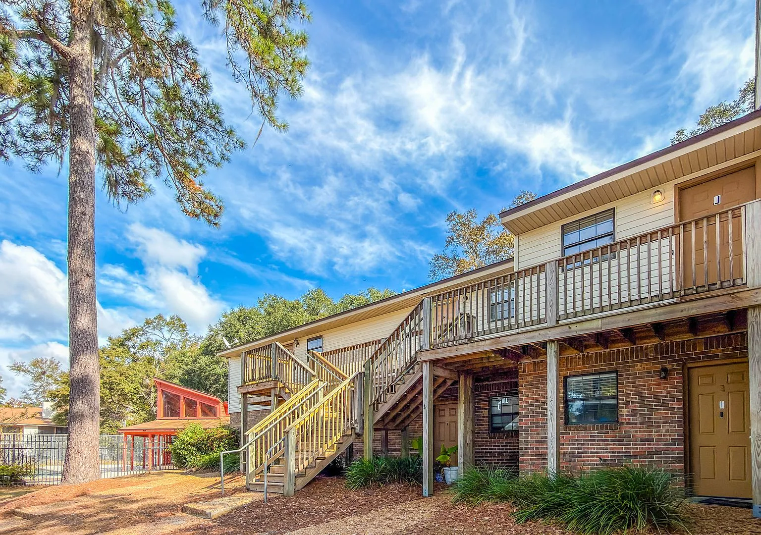 Fabulous 2/2 W/ Fireplace, Deck, Washer/Dryer, & Community Pool! $1200/Month Avail Now! — Photo 1