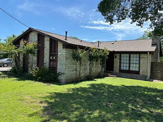 Front exterior of carport and front right side of Unit B. - 702B Ranch Rd