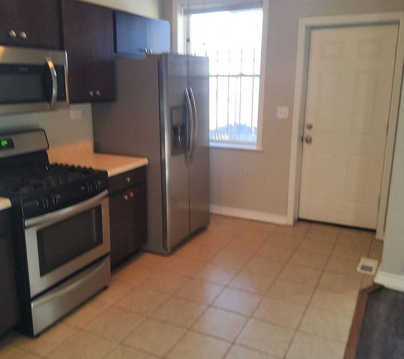 1st image of 7028 S Eberhart Ave #1