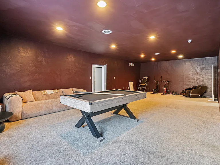 Multi-functional space with a playroom and gym space.