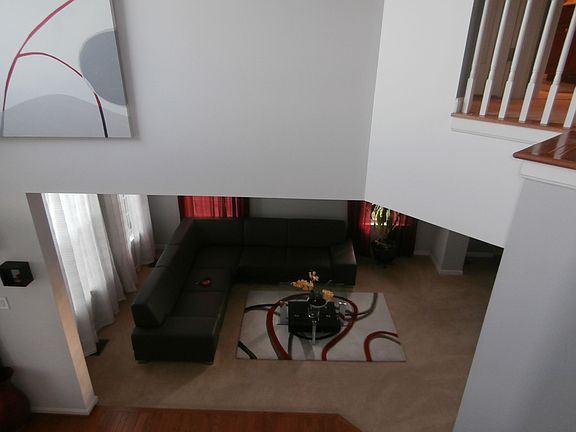 two story foyer overlooking LR