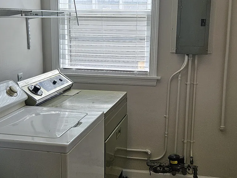 Main floor furnished laundry room