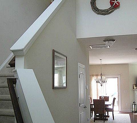 Two-story foyer with large coat closet