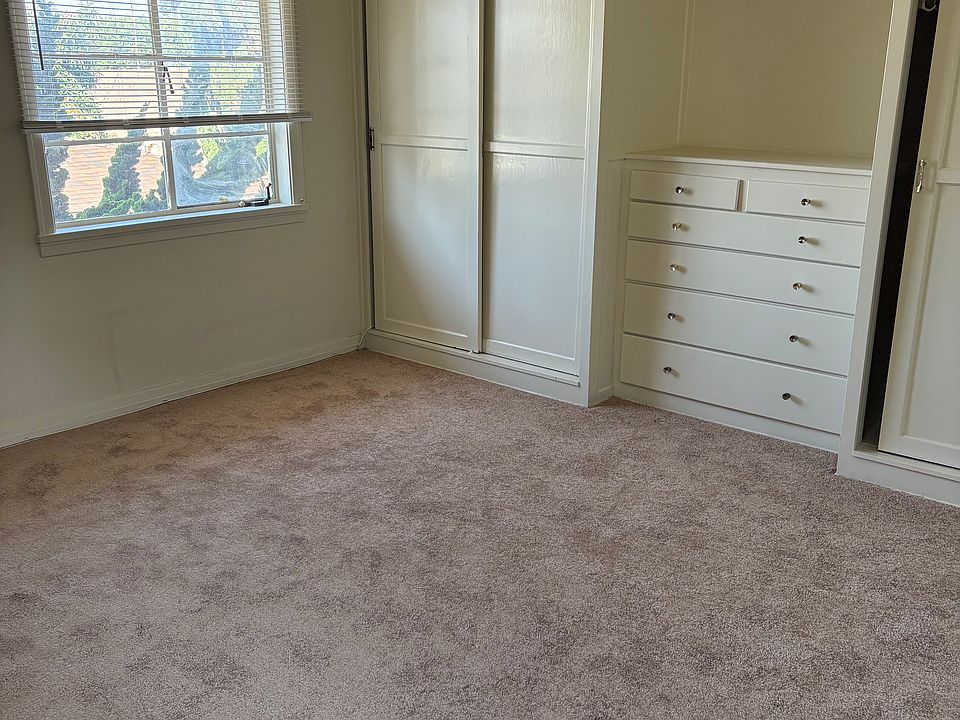 Bedroom with built in dresser