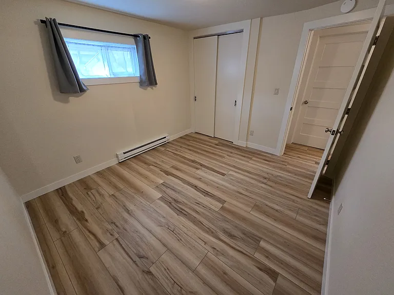 The south bedroom is a little smaller. Past tenants have used this as an office/guest bedroom.