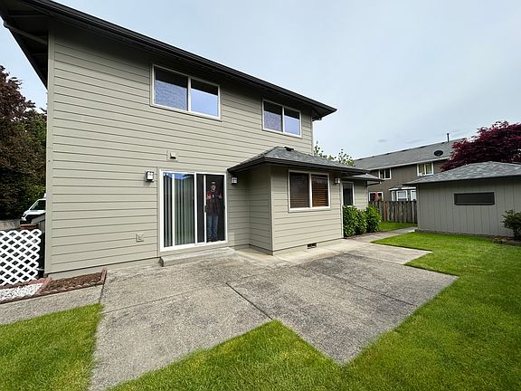 Backyard has BBQ and Bike storage