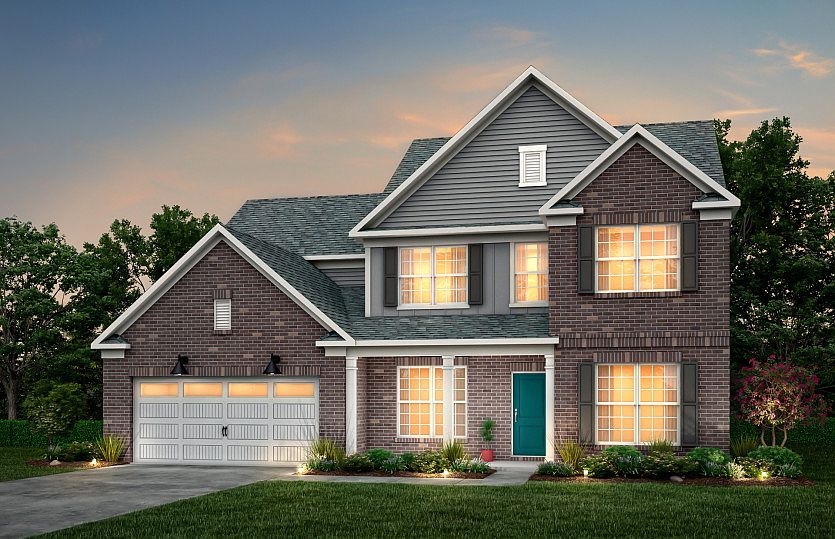 Wingate Exterior 58 features brick, siding, covered front sitting porch and 2 car garage