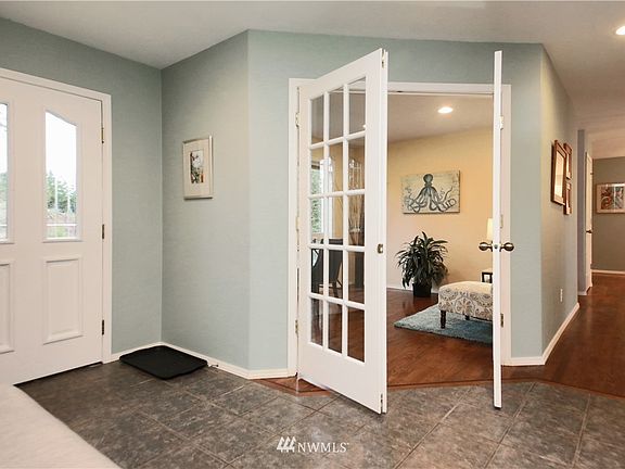 Off the entry is a lovely home office built for privacy away from the main living areas.