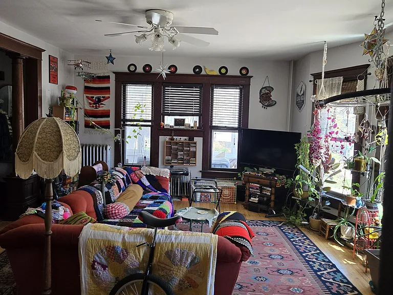 Living room with gorgeous woodwork and molding