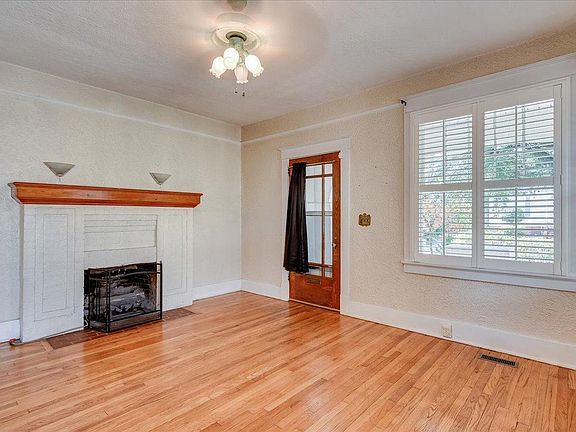 Adorable Living room with Plantation Shutters
