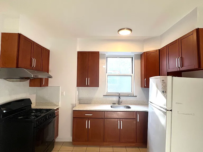 Kitchen with a side window providing natural light and ventilation