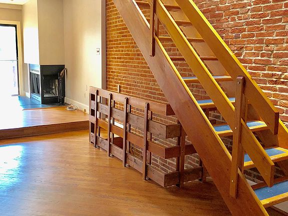 Stairs to basement level and second level