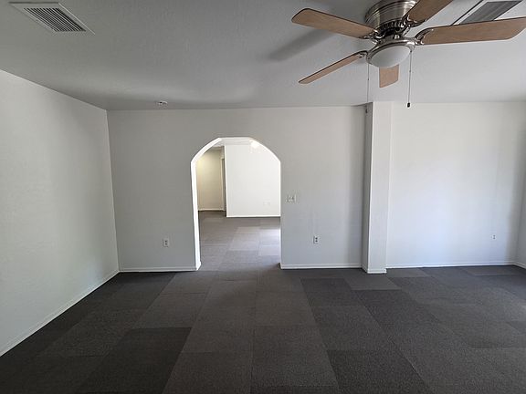 Living room looking into dining area.