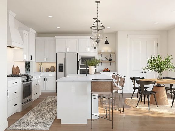 Kitchen with floating shelves and pendant lighting