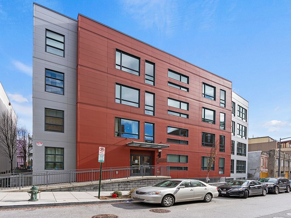 Champlain Street facade with ramp walkway to first floor, main entrance.