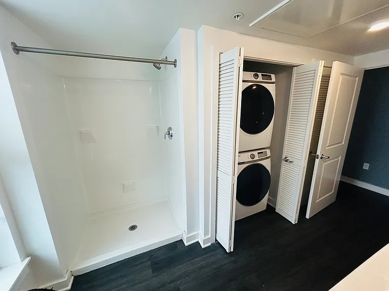 Bath Shower and Washer / Dryer Closet