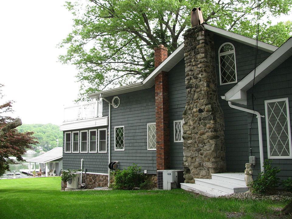 Left side of House, Lake/Boathouse in distance