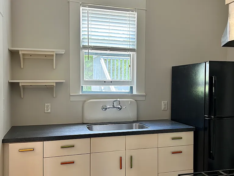8 x 10 galley kitchen, fridge with ice machine, gas stove, ikea cabinets, window that looks into backyard