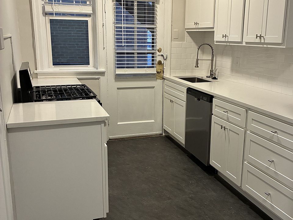 Remodeled kitchen with stainless steel appliances.