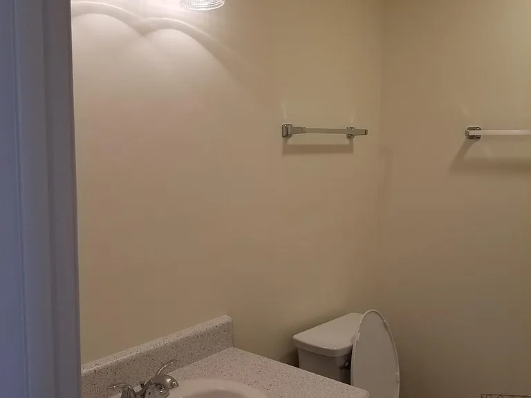 Upstairs full hall bath next to 2nd bedroom