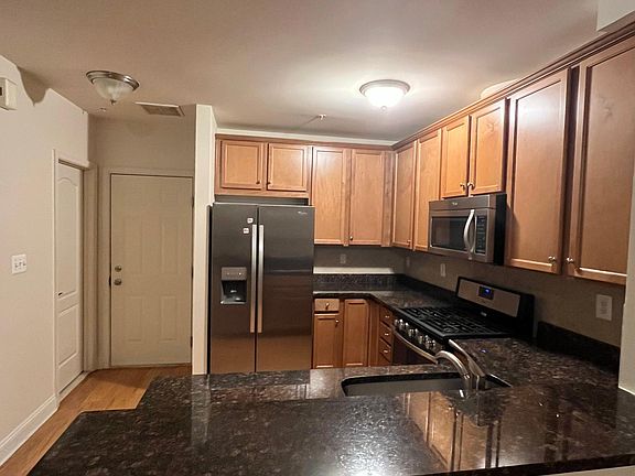 Open Kitchen with all stainless steel appliances -Refrigerator, Microwave, Dishwasher, Garbage disposal, Oven , Bar lights and PANTRY