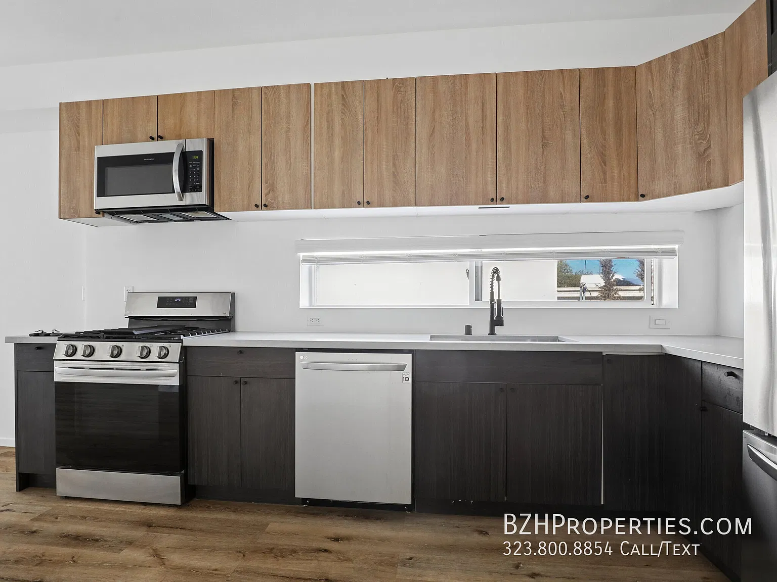 Contemporary 3 Bedroom Home with In-Unit Laundry & 2-Car Garage — Photo 4