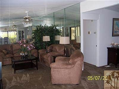 Living room with wall mirror