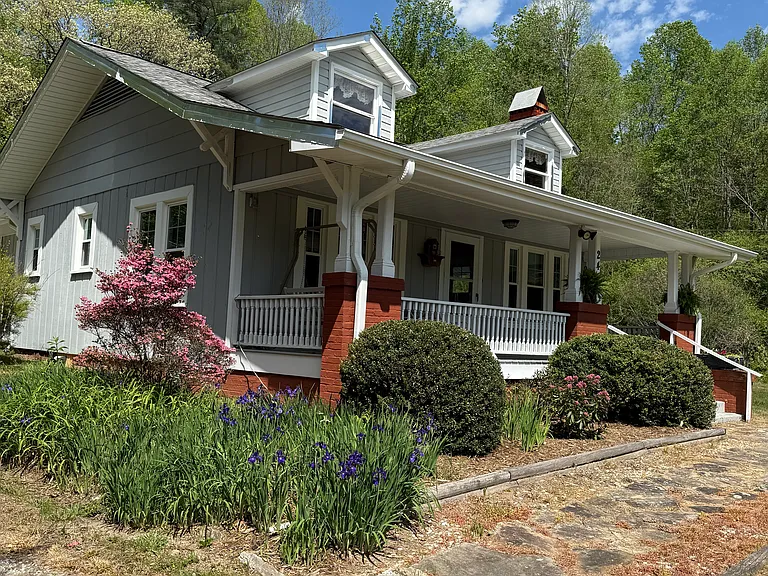 Relaxing front porch with porch swing