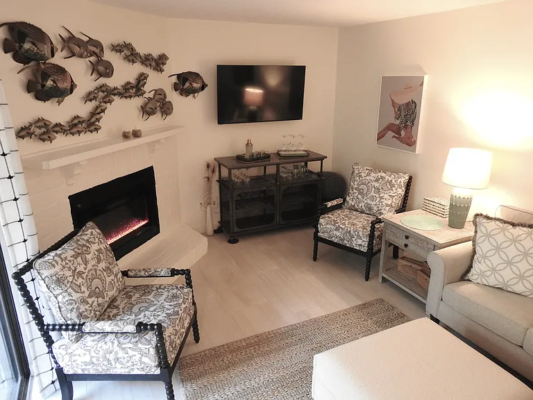 Living room enhanced with soft relaxing color scheme and decor