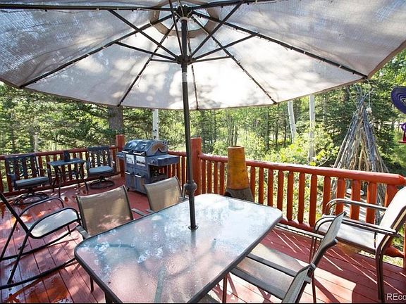 Wood porch with tepee in the back