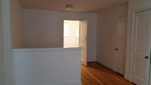Looking into dining room area / kitchen door.