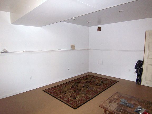 Downstairs living room with recessed lighting